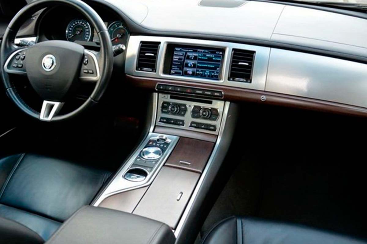 Jaguar XF white sedan 6