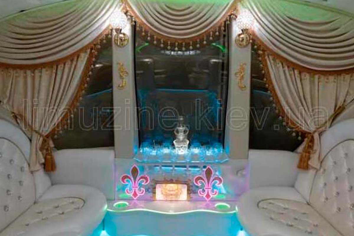 Excalibur white limousine carriage 6