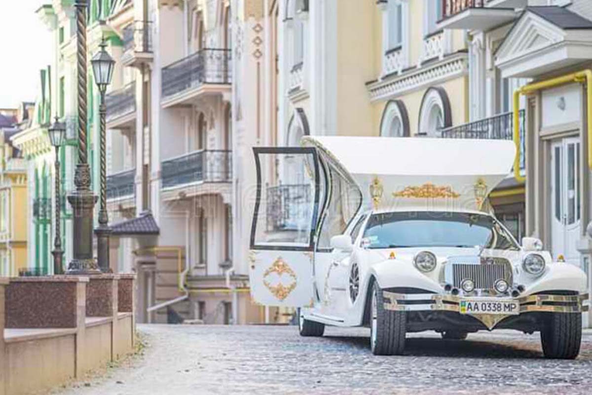 Excalibur white limousine carriage 2